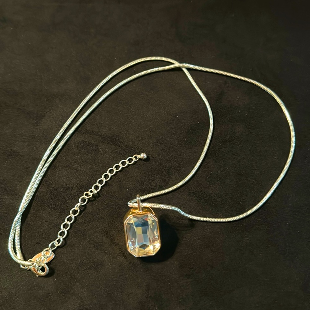 Brilliant, silver and gold tone,pendant necklace.